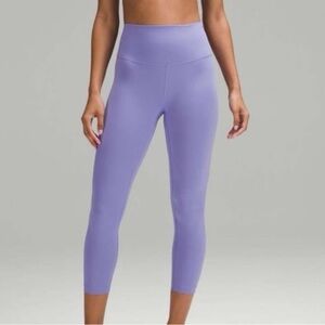 Lululemon Wunder train HR tight 25” Dark Lavender size 6